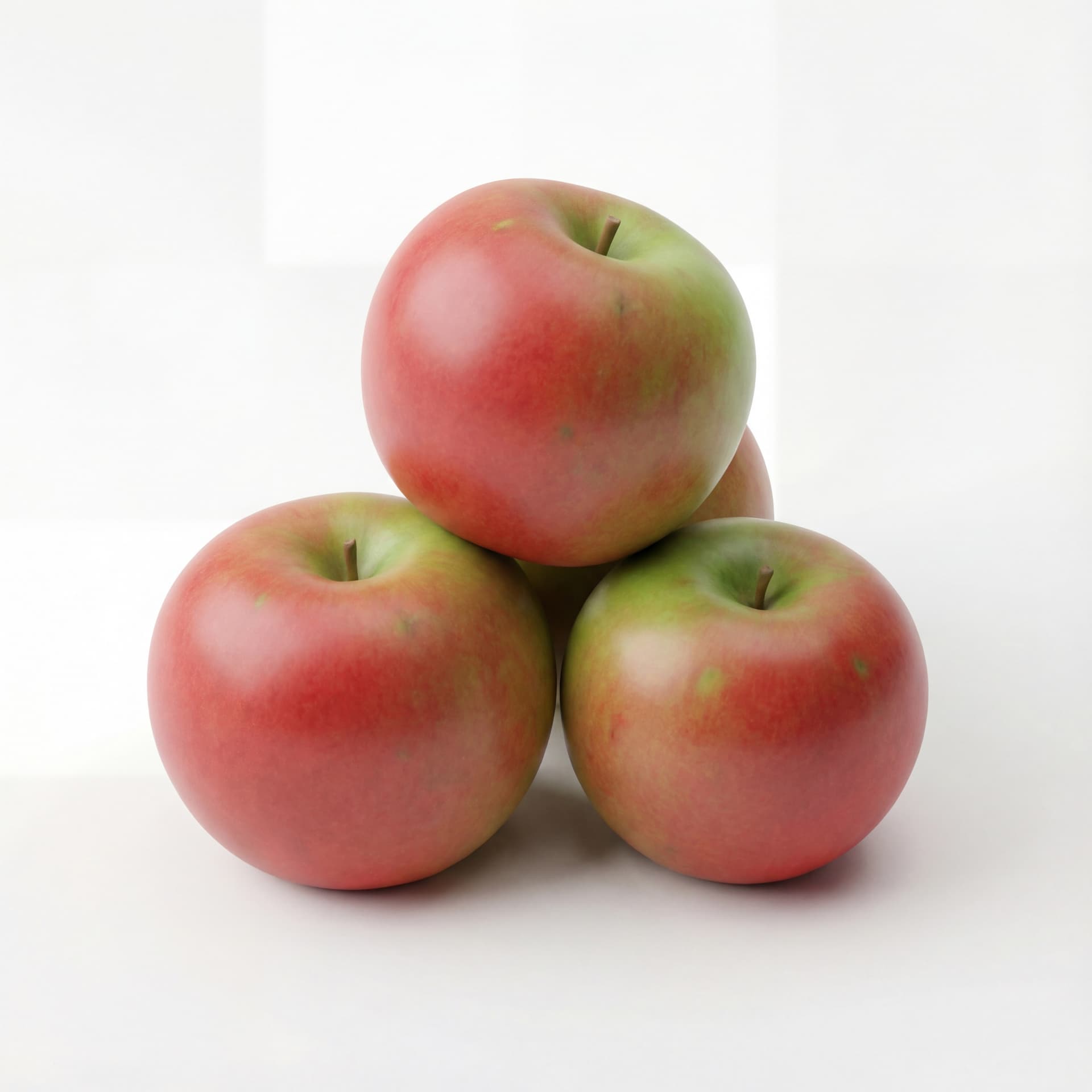 A group of three rounded apples stacked casually in a small pyramid, smooth inflated surfaces, natural contact points between fruits.