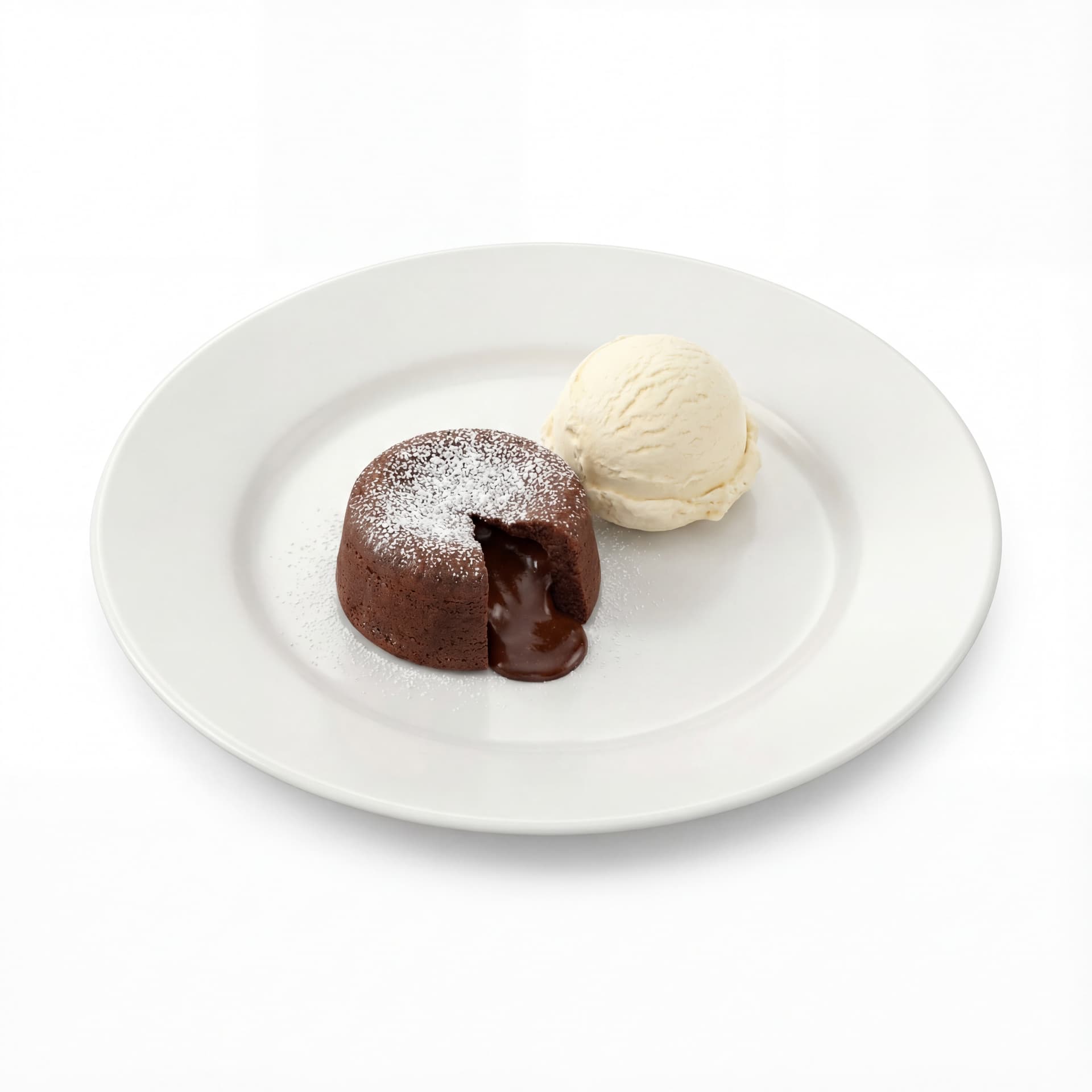 A round dessert plate featuring chocolate lava cake, powdered sugar dusting, and vanilla ice cream scoop.