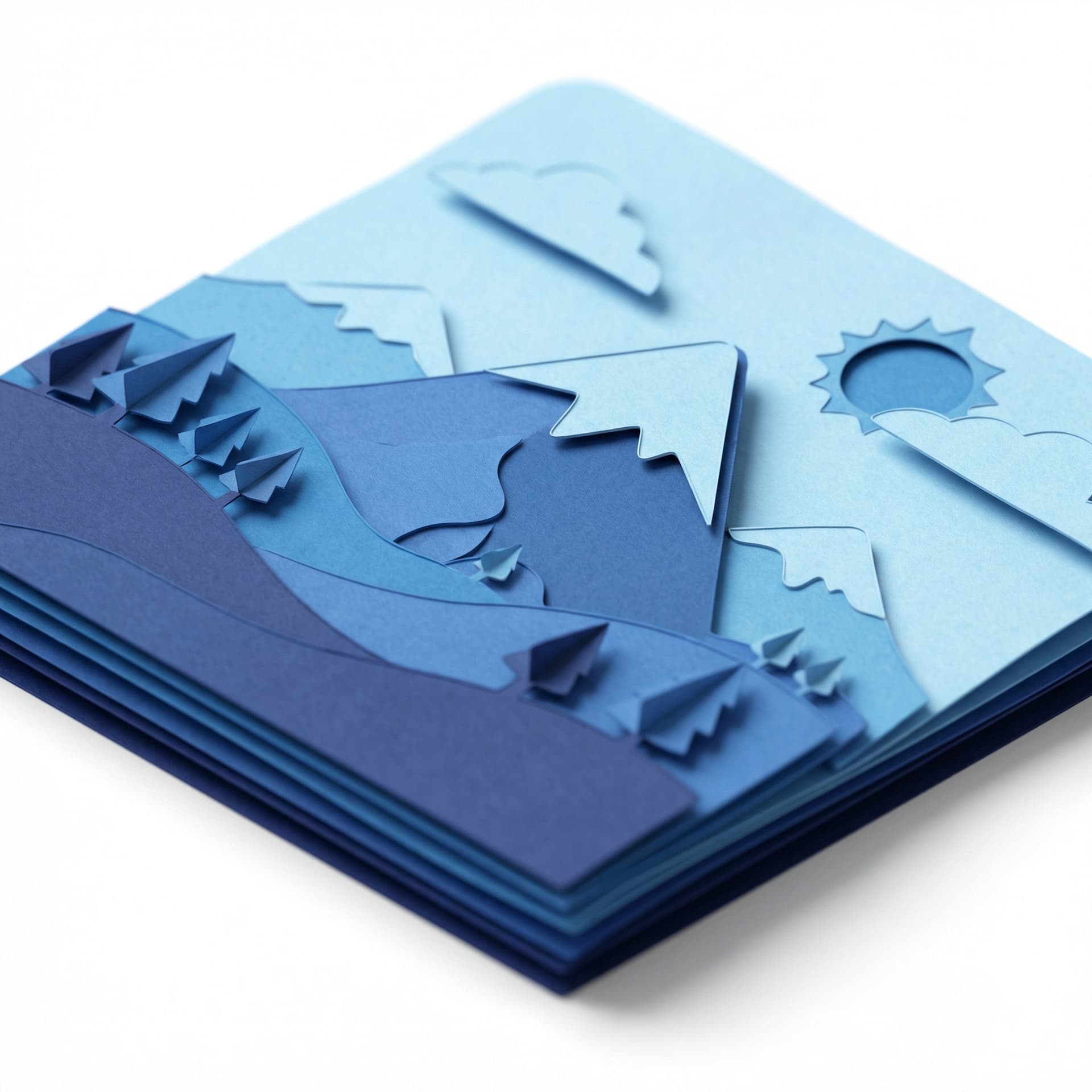 Isometric icon of a mountain landscape, layered paper cutout style, different shades of blue paper, depth of field, craft art aesthetic, white background.