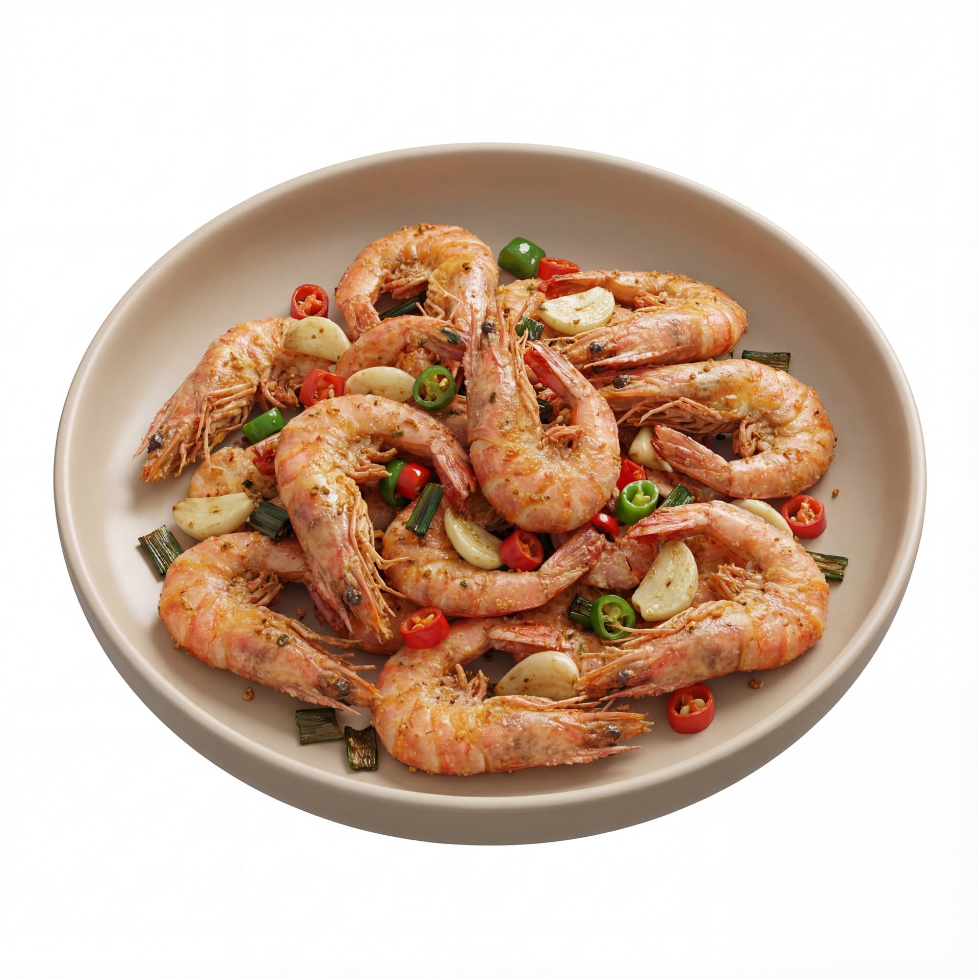A round plate featuring salt-and-pepper shrimp with shell-on shrimp, sliced garlic, chopped chili, and fried scallions.
