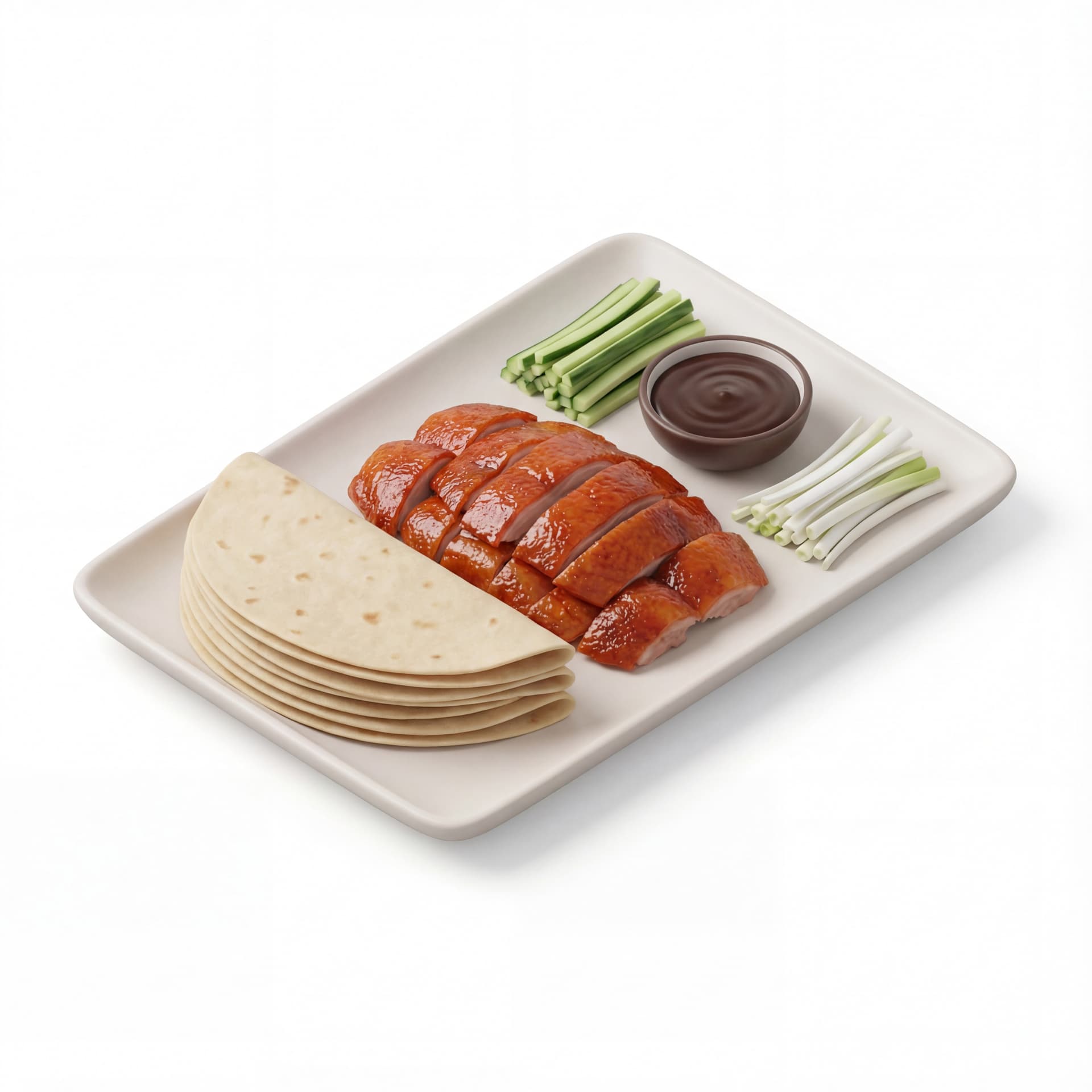 A rectangular plate featuring crispy Peking duck slices, thin pancakes stacked on the side, cucumber strips, scallions, and hoisin sauce.
